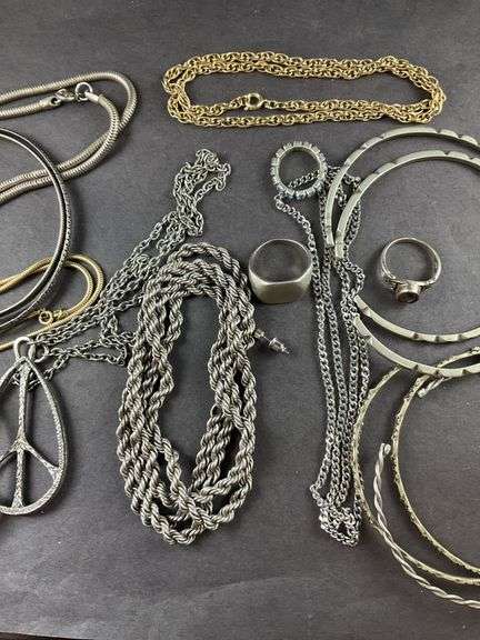 Assorted costume jewelry , Necklaces, bracelets, rings