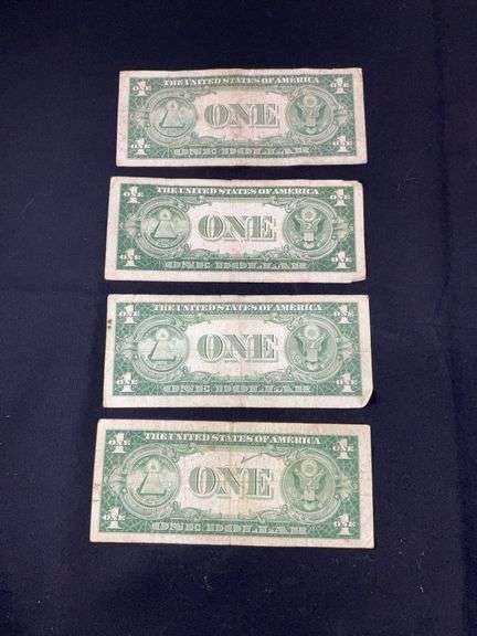 Four silver certificates all 1935 with series D(2), G, and F