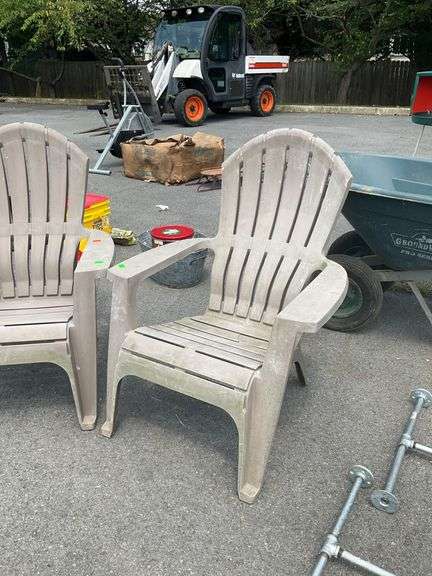 Beige Plastic Patio Chairs with Crack in Seat