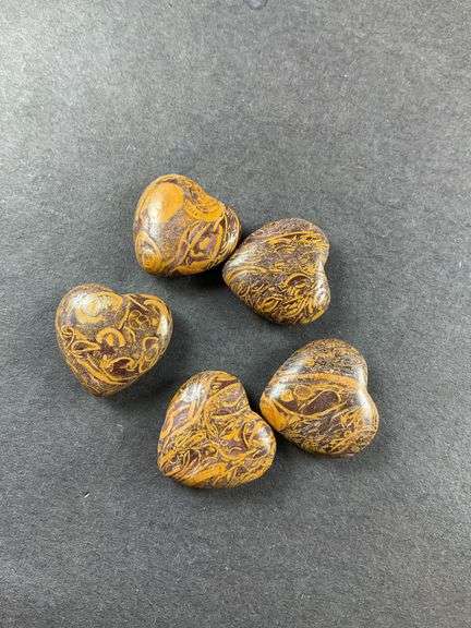 Five heart shaped stones