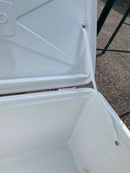 Red Igloo Cooler with Hinged Lid and Side Handles