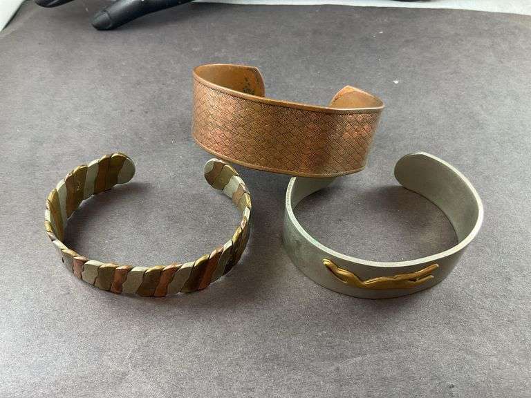 Three Cuff Bracelets One of Copper, One Copper And Silvertone, One Heavy Silver Tone
