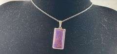 Purple turquoise pendant platinum bond and stainless steel chain 20in