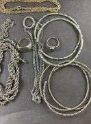 Assorted costume jewelry , Necklaces, bracelets, rings