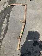 Two-Handed Scythe With Curved Wooden Handle and Metal Blade