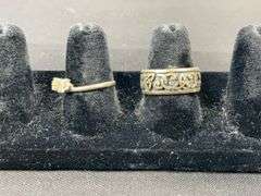 Two sterling silver rings, one is missing a stone, sizes 8.25 and 9, 9.1grams