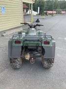 Kawasaki Bayou 300 4-Wheeler, 4x4. Front 4 foot blade and winch.
