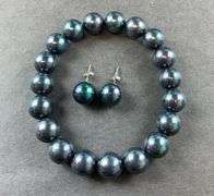Sterling silver peacock shell pearl stud earrings and stretch bracelet