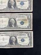 Four silver certificates 1957(2) and 1957B(2)