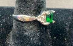 Green and white CZ plated ring size 6