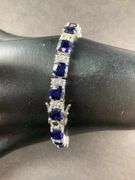 “EMA” Bracelet With Sapphire Like Stones And CZ's 18.7 grams Sterling Silver size 7.5"
