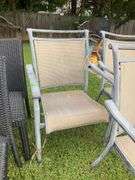 Two Wicker Patio Chairs and Three Aluminum Frame Canvas Chairs