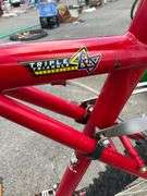 GT Palomar Red Bicycle with Rear Cargo Rack and Triple Triangle Technology