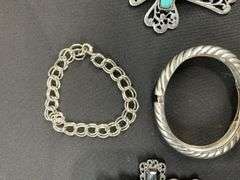 Costume jewelry, two cross pendants and two bracelets