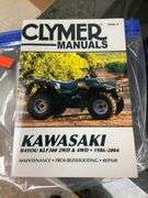 Kawasaki Bayou 300 4-Wheeler, 4x4. Front 4 foot blade and winch.