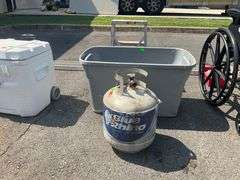 Propane Tank with very little Fuel and Plastic Tote
