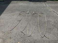 Four Curved Metal Frames
