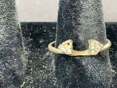 Two sterling silver rings, one is missing a stone, sizes 8.25 and 9, 9.1grams