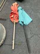 Two Patio Umbrellas With Fabric Damage
