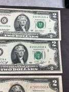 1953C $2 red seal, 1976 $2 green seal, and a 2003A $2 green seal