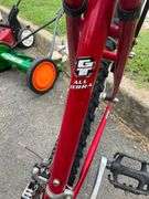 GT Palomar Red Bicycle with Rear Cargo Rack and Triple Triangle Technology