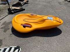 Yellow Rubbermaid Snow Sled with Rope Handle