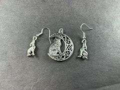 Wolf moon silvertone pendant and howling wolf dangle earrings