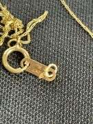 Scrap gold, broken 10k yellow gold chain tested and weighs 0.6 g