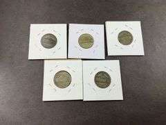 Five silver Jefferson nickels