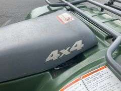 Kawasaki Bayou 300 4-Wheeler, 4x4. Front 4 foot blade and winch.