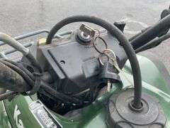 Kawasaki Bayou 300 4-Wheeler, 4x4. Front 4 foot blade and winch.