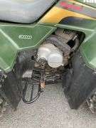 Kawasaki Bayou 300 4-Wheeler, 4x4. Front 4 foot blade and winch.