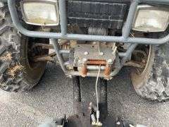 Kawasaki Bayou 300 4-Wheeler, 4x4. Front 4 foot blade and winch.