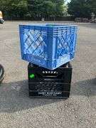 Two Plastic Crates: One Blue Pace and One Black Dairy Maid Dairy