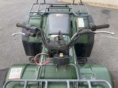 Kawasaki Bayou 300 4-Wheeler, 4x4. Front 4 foot blade and winch.