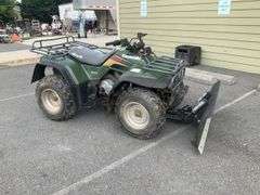 Kawasaki Bayou 300 4-Wheeler, 4x4. Front 4 foot blade and winch.