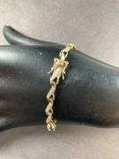 Gold Tone Silver Bracelet With Sapphires Made In China 7.9 grams Sterling Silver size 7.5"