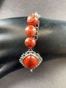 Red jasper 8-10in silvertone bracelet