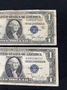 Four silver certificates all 1935 with series D(2), G, and F