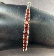 Bangle Bracelet Side Clasp With Garnet Colored Stone 13.8 grams Sterling Silver size 2 1/2"