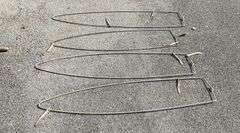 Four Curved Metal Frames
