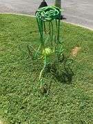 Green Metal Swirling Yard Decoration, 27″H