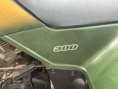 Kawasaki Bayou 300 4-Wheeler, 4x4. Front 4 foot blade and winch.