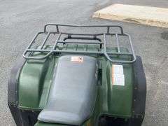 Kawasaki Bayou 300 4-Wheeler, 4x4. Front 4 foot blade and winch.