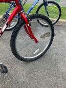 GT Palomar Red Bicycle with Rear Cargo Rack and Triple Triangle Technology
