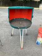 Metal Barrel-Style Grill with Hinged Lid and Rolling Stand