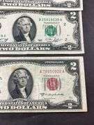 1953C $2 red seal, 1976 $2 green seal, and a 2003A $2 green seal