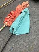 Two Patio Umbrellas With Fabric Damage