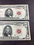 Two 1963 $5 red seals