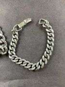 Two Men's Bracelet One Is Engraved With "Gary"